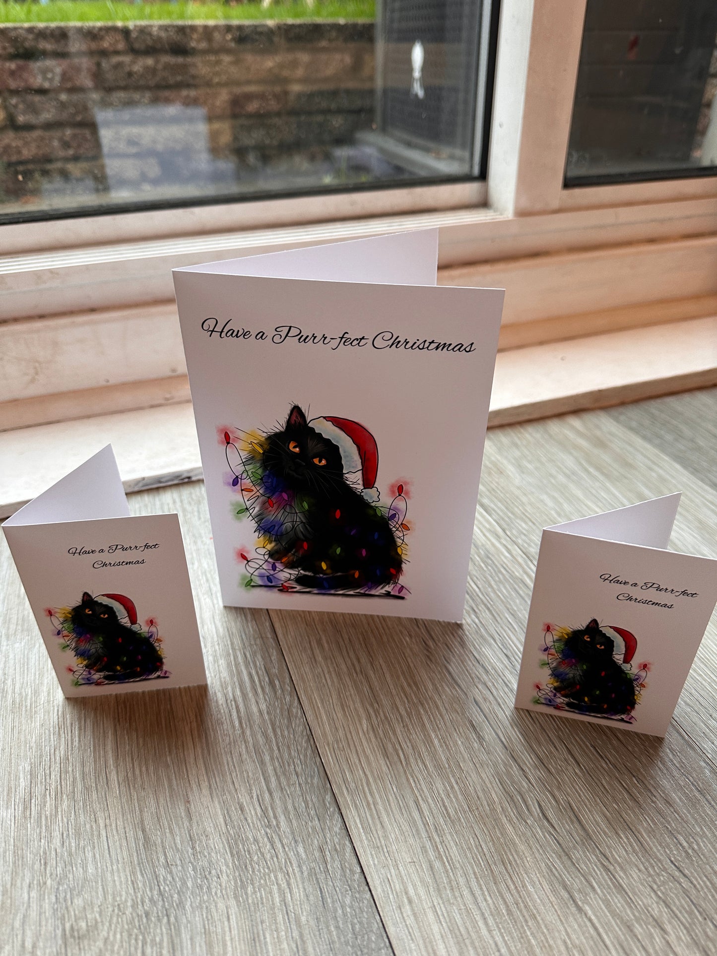 Black Cat Christmas Greeting cards & Prints